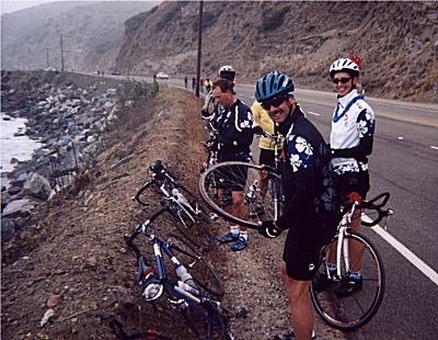 Robbie's photo of riders taking a break along the highway on the California AIDSRIde