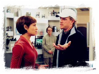 robbie directs jolene blalock (t'pol) on the set of enterprise